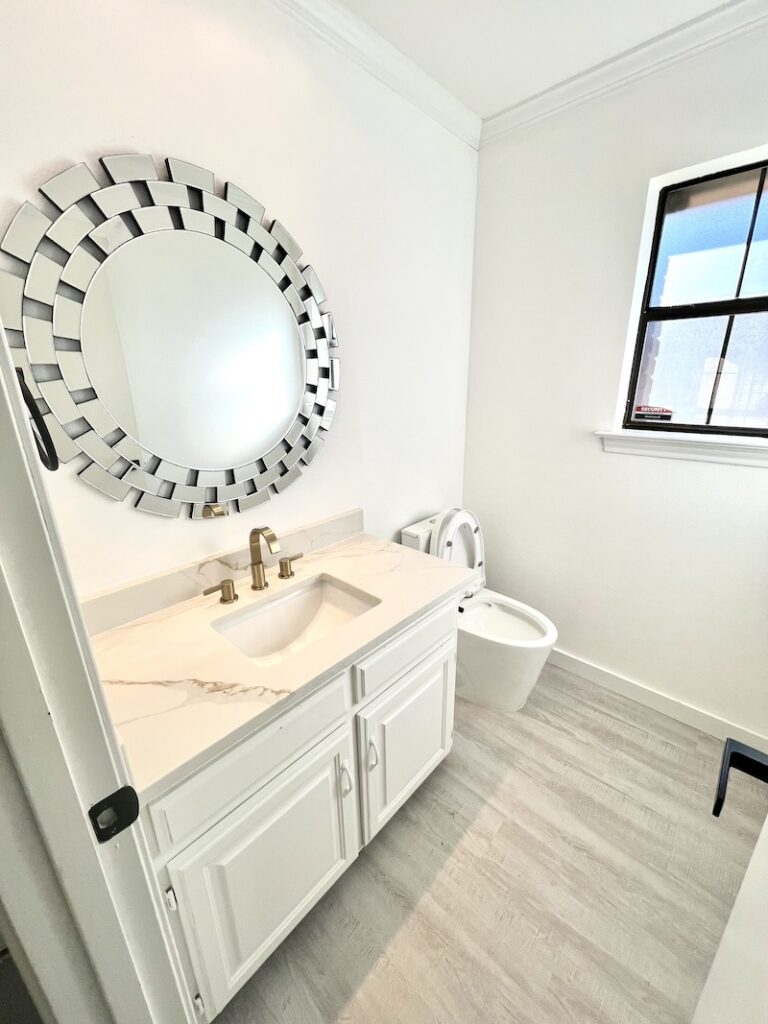 bathroom cabinets with round mirror