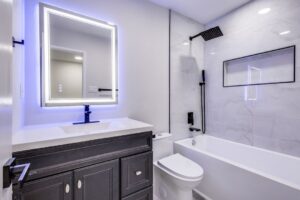 bathroom remodeled with black cabinets