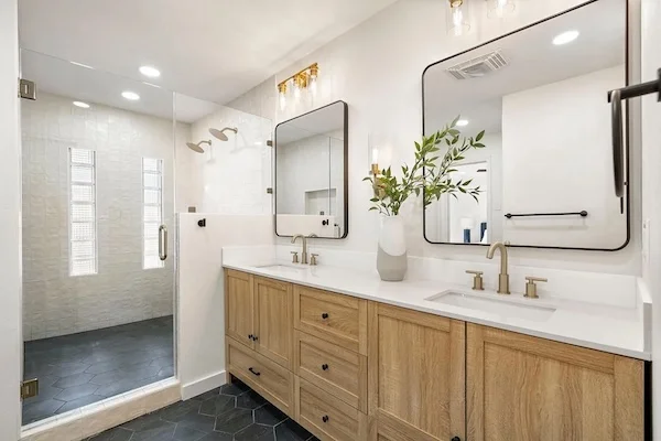 Luxury bathroom renovation with modern fixtures and tile work in Dallas TX